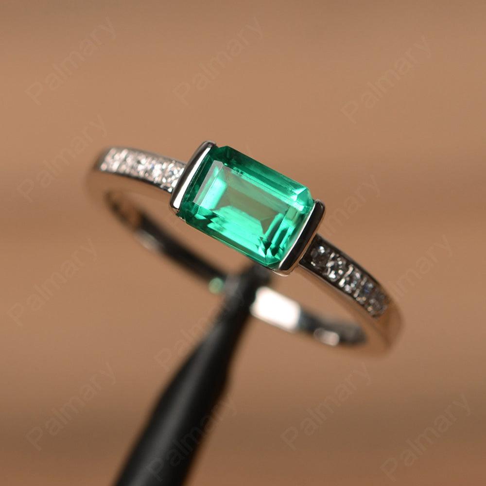 East West Emerald Cut Emerald Rings - Palmary