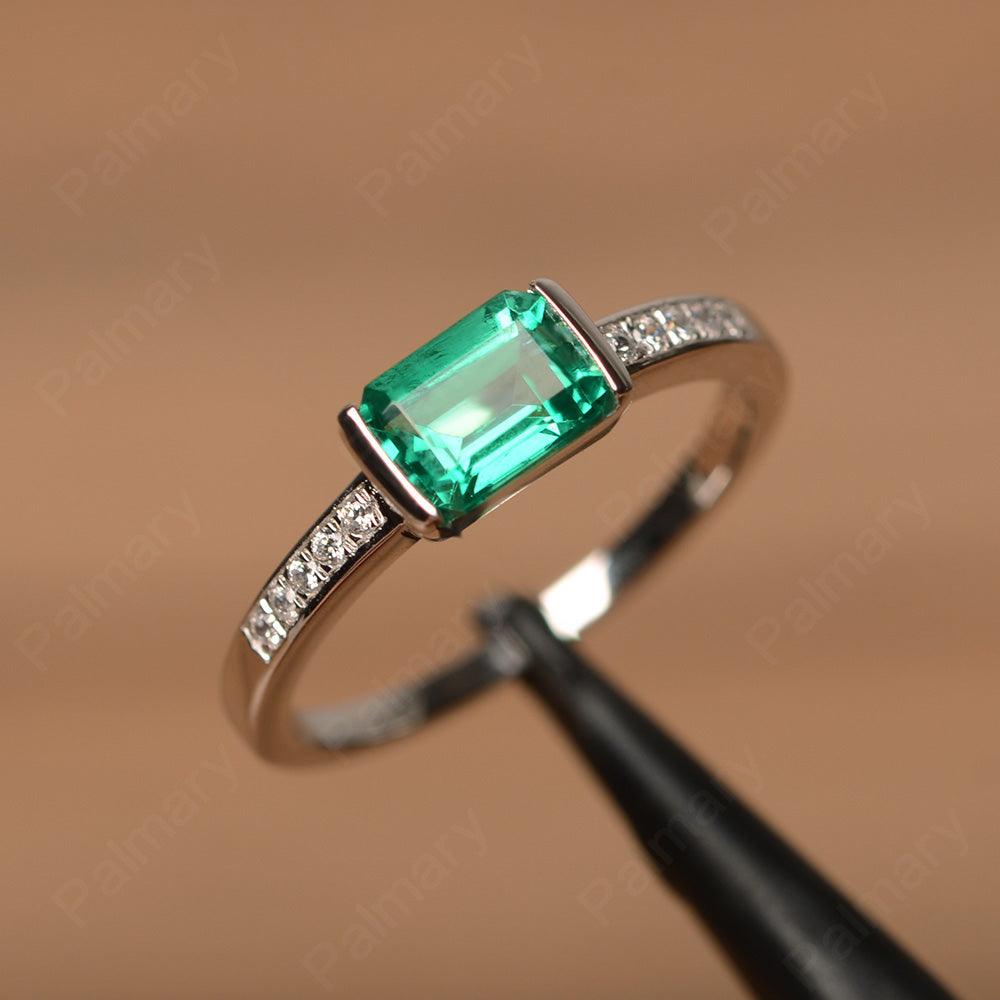 East West Emerald Cut Emerald Rings - Palmary