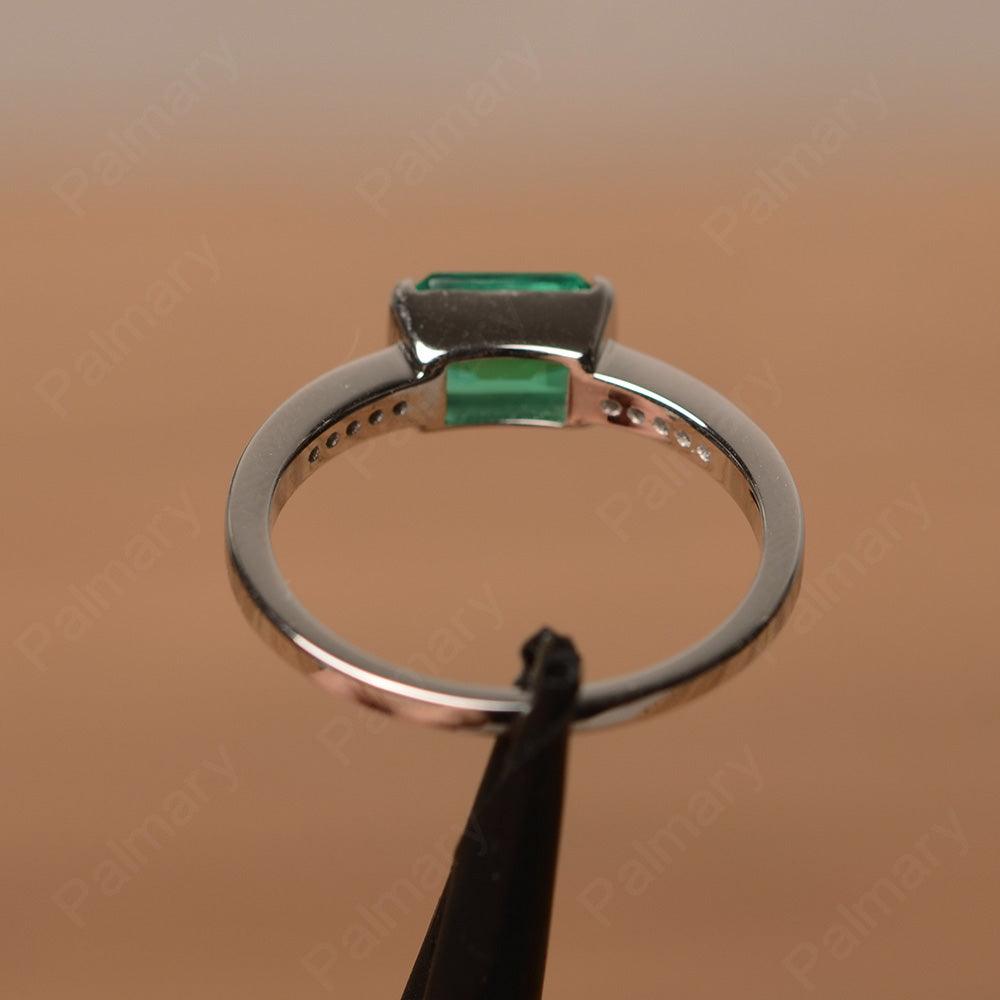 East West Emerald Cut Emerald Rings - Palmary
