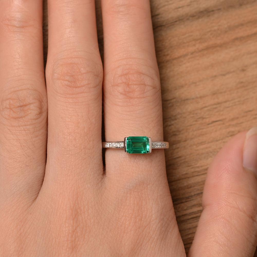 East West Emerald Cut Emerald Rings - Palmary