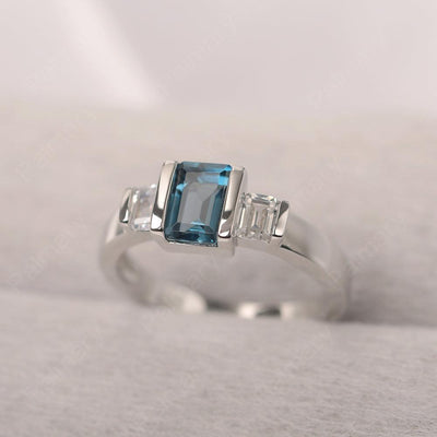 Three Stone Emerald Cut London Blue Topaz Rings - Palmary