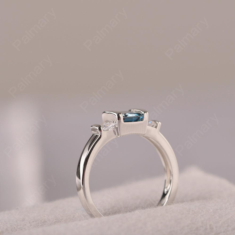 Three Stone Emerald Cut London Blue Topaz Rings - Palmary