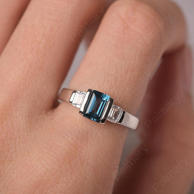 Three Stone Emerald Cut London Blue Topaz Rings - Palmary