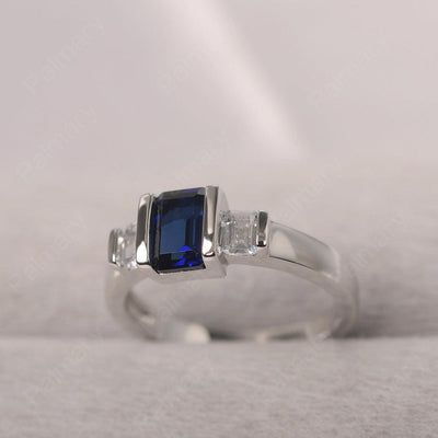 Three Stone Emerald Cut Sapphire Rings - Palmary