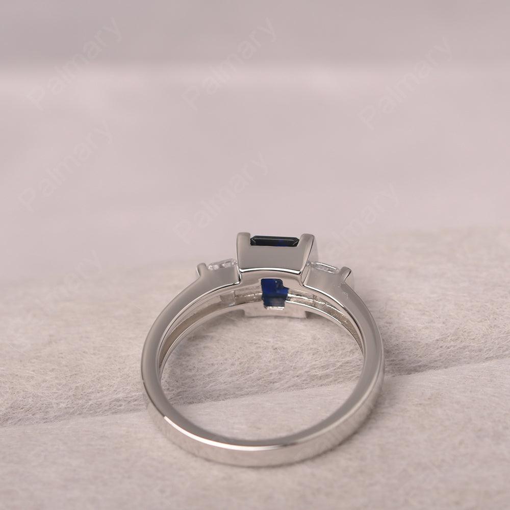 Three Stone Emerald Cut Sapphire Rings - Palmary