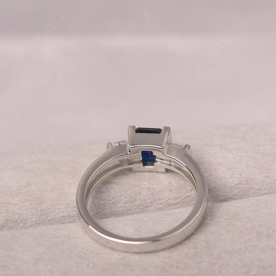 Three Stone Emerald Cut Sapphire Rings - Palmary