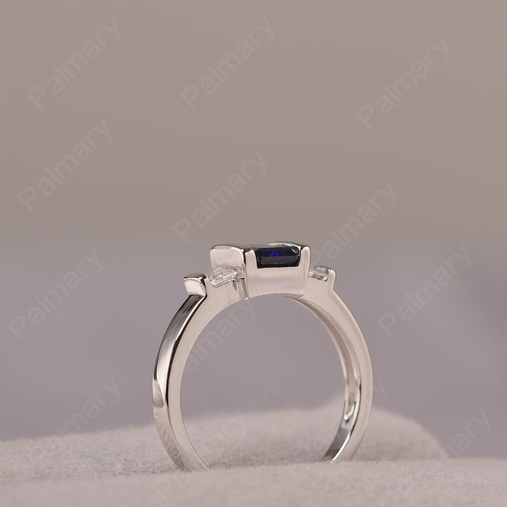 Three Stone Emerald Cut Sapphire Rings - Palmary