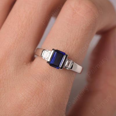 Three Stone Emerald Cut Sapphire Rings - Palmary