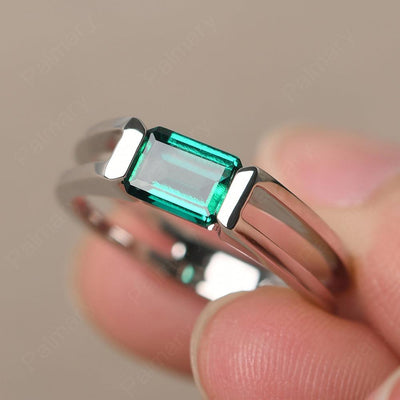 East West Emerald Cut Emerald Solitaire Ring - Palmary