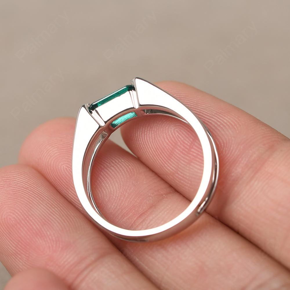 East West Emerald Cut Emerald Solitaire Ring - Palmary