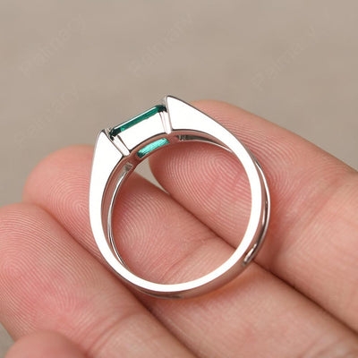 East West Emerald Cut Emerald Solitaire Ring - Palmary