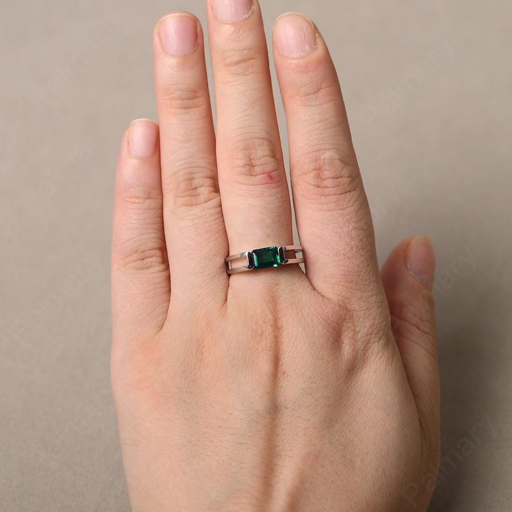 East West Emerald Cut Emerald Solitaire Ring - Palmary