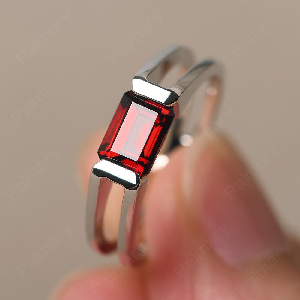East West Emerald Cut Garnet Solitaire Ring - Palmary