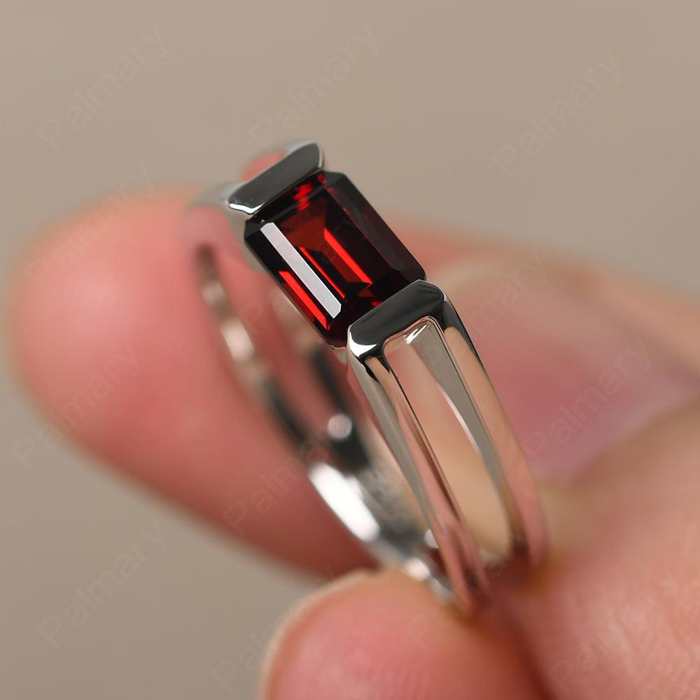 East West Emerald Cut Garnet Solitaire Ring - Palmary