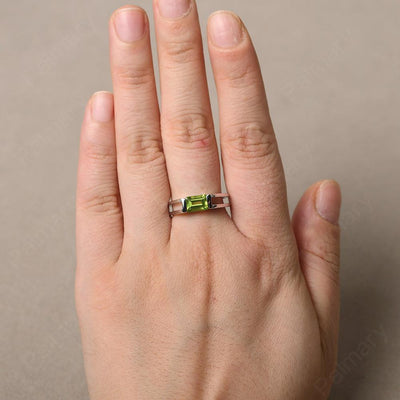 East West Emerald Cut Peridot Solitaire Ring - Palmary