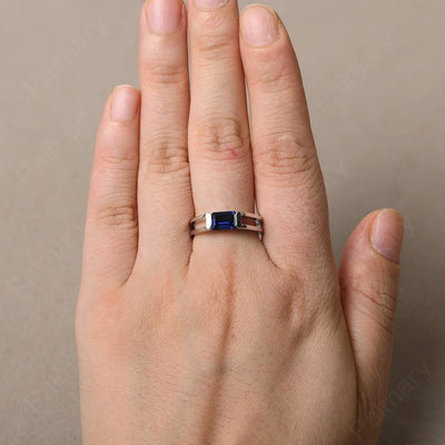 East West Emerald Cut Sapphire Solitaire Ring - Palmary