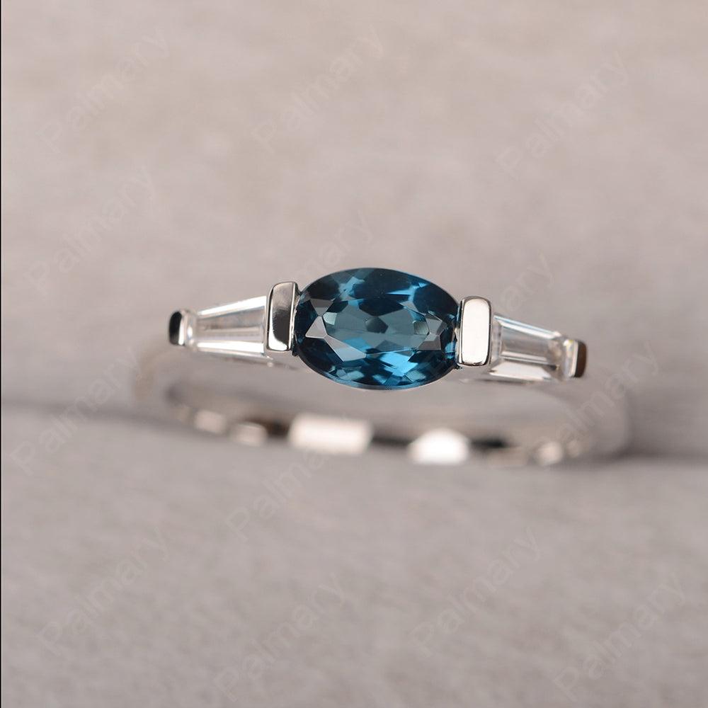 East West Oval London Blue Topaz Engagement Ring - Palmary