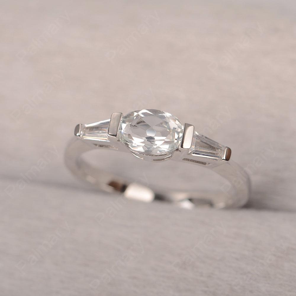 East West Oval White Topaz Engagement Ring - Palmary