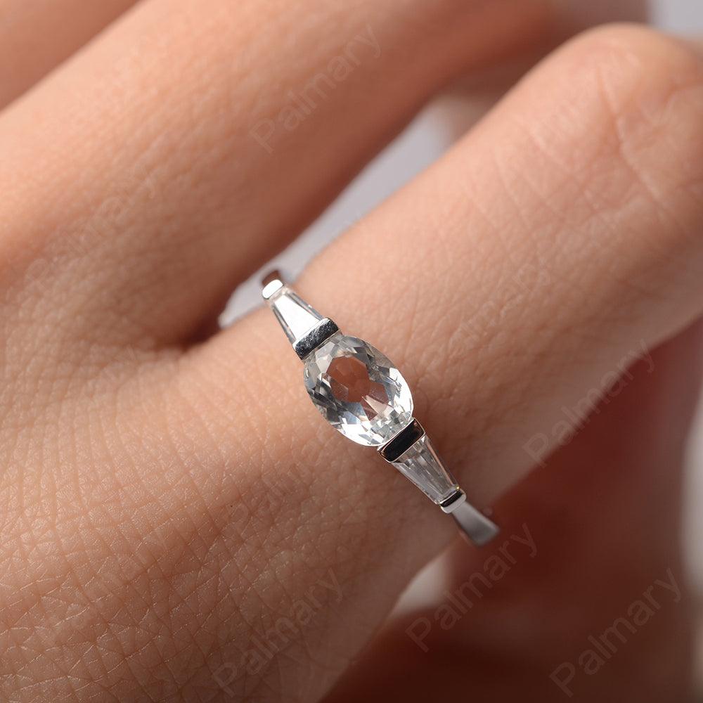 East West Oval White Topaz Engagement Ring - Palmary