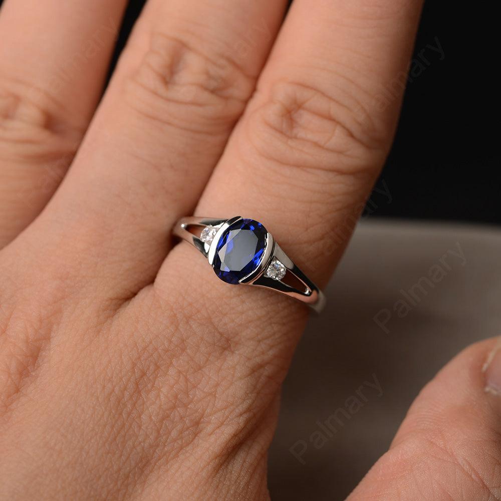 Half Bezel Oval Cut Sapphire Rings - Palmary