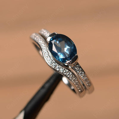 Horizontal Oval Cut London Blue Topaz Wedding Ring Set - Palmary