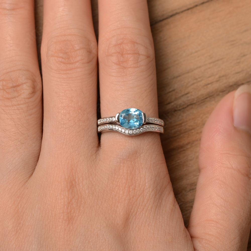 Horizontal Oval Cut Swiss Blue Topaz Wedding Ring Set - Palmary