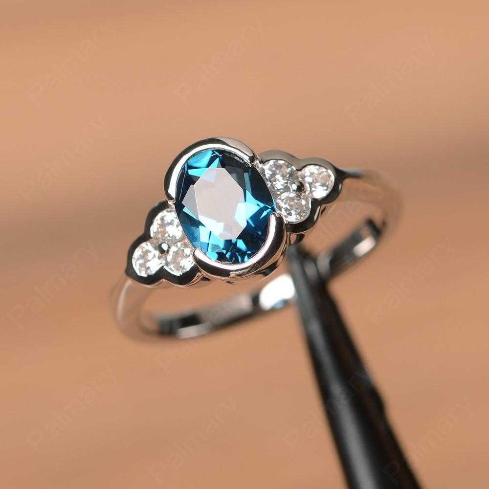 London Blue Topaz Bezel Oval Engagement Ring - Palmary