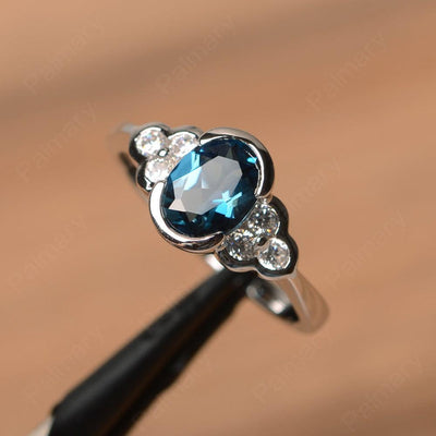 London Blue Topaz Bezel Oval Engagement Ring - Palmary