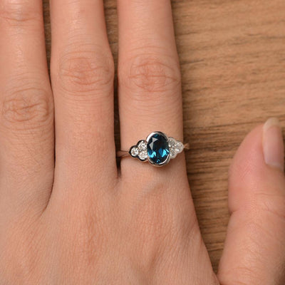 London Blue Topaz Bezel Oval Engagement Ring - Palmary