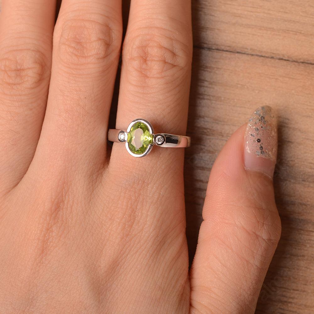 Oval Peridot Bezel Engagement Rings - Palmary