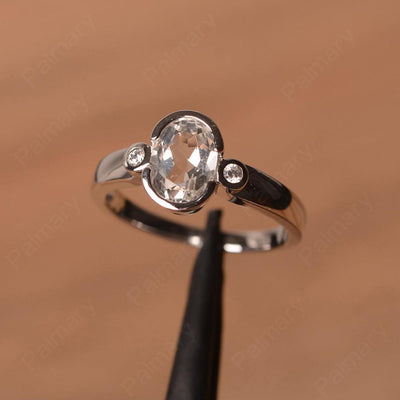 Oval White Topaz Bezel Engagement Rings - Palmary