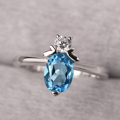 Oval Cut Swiss Blue Topaz Bee Ring - Palmary