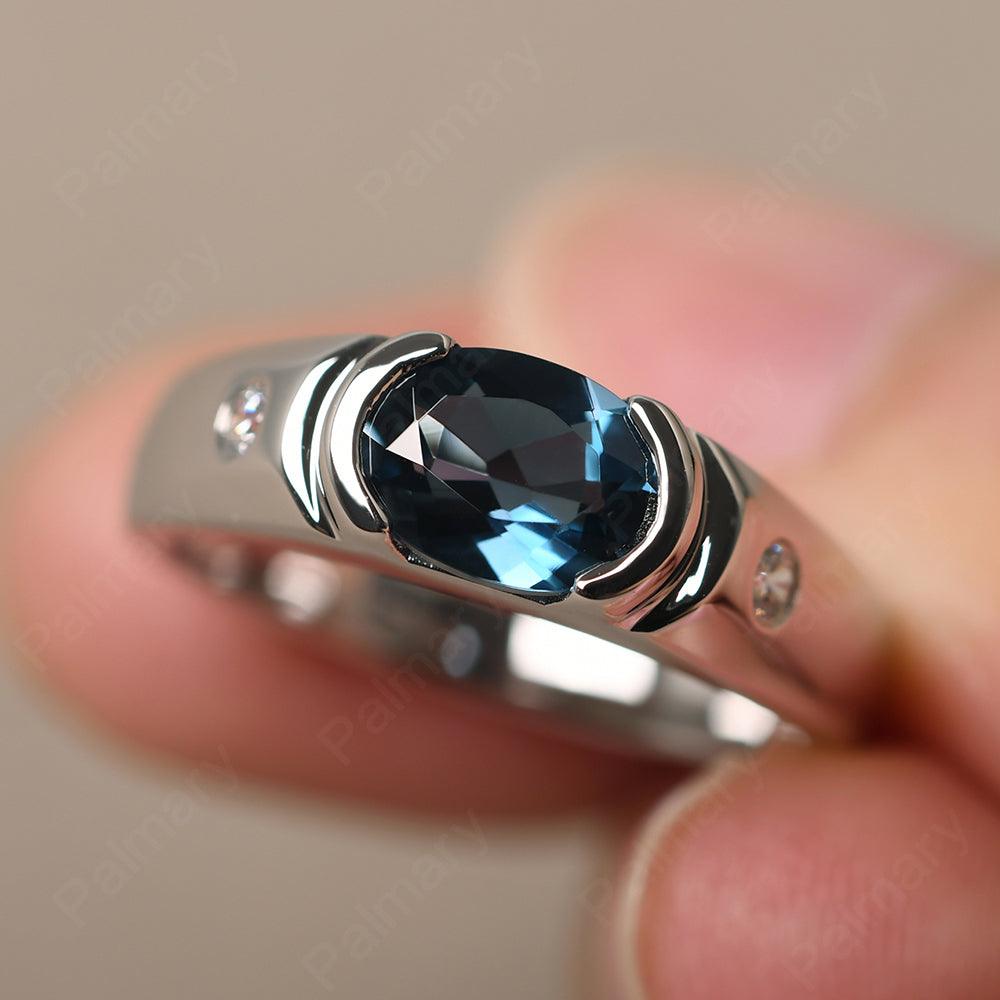 East West Oval Cut London Blue Topaz Ring - Palmary