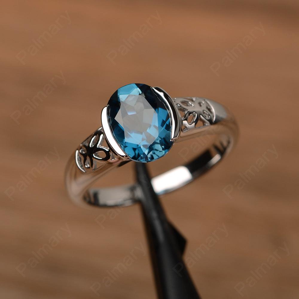 Oval Vintage London Blue Topaz Engagement Rings - Palmary
