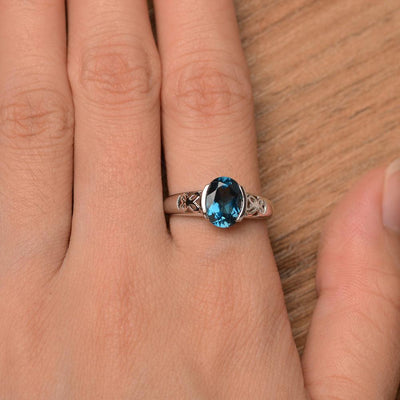 Oval Vintage London Blue Topaz Engagement Rings - Palmary