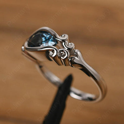 East West Pear Shaped Vintage London Blue Topaz Ring - Palmary