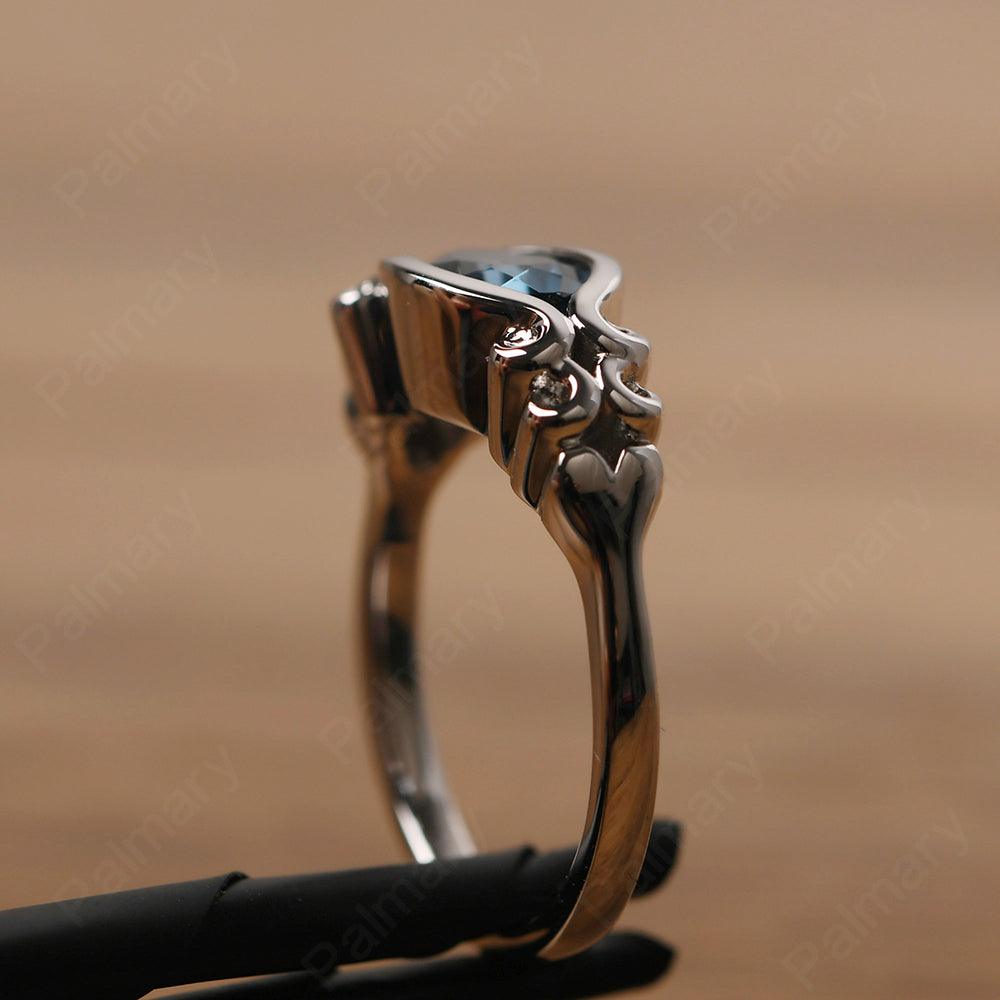 East West Pear Shaped Vintage London Blue Topaz Ring - Palmary