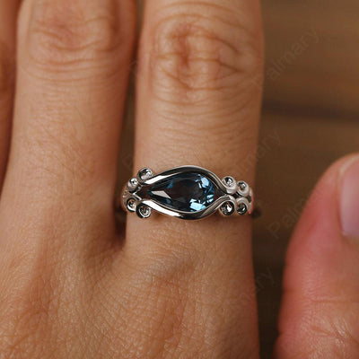East West Pear Shaped Vintage London Blue Topaz Ring - Palmary