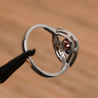 Eye Shaped Garnet Bezel Rings - Palmary