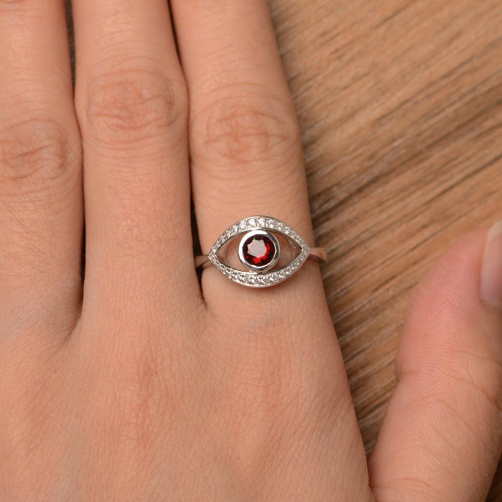 Eye Shaped Garnet Bezel Rings - Palmary