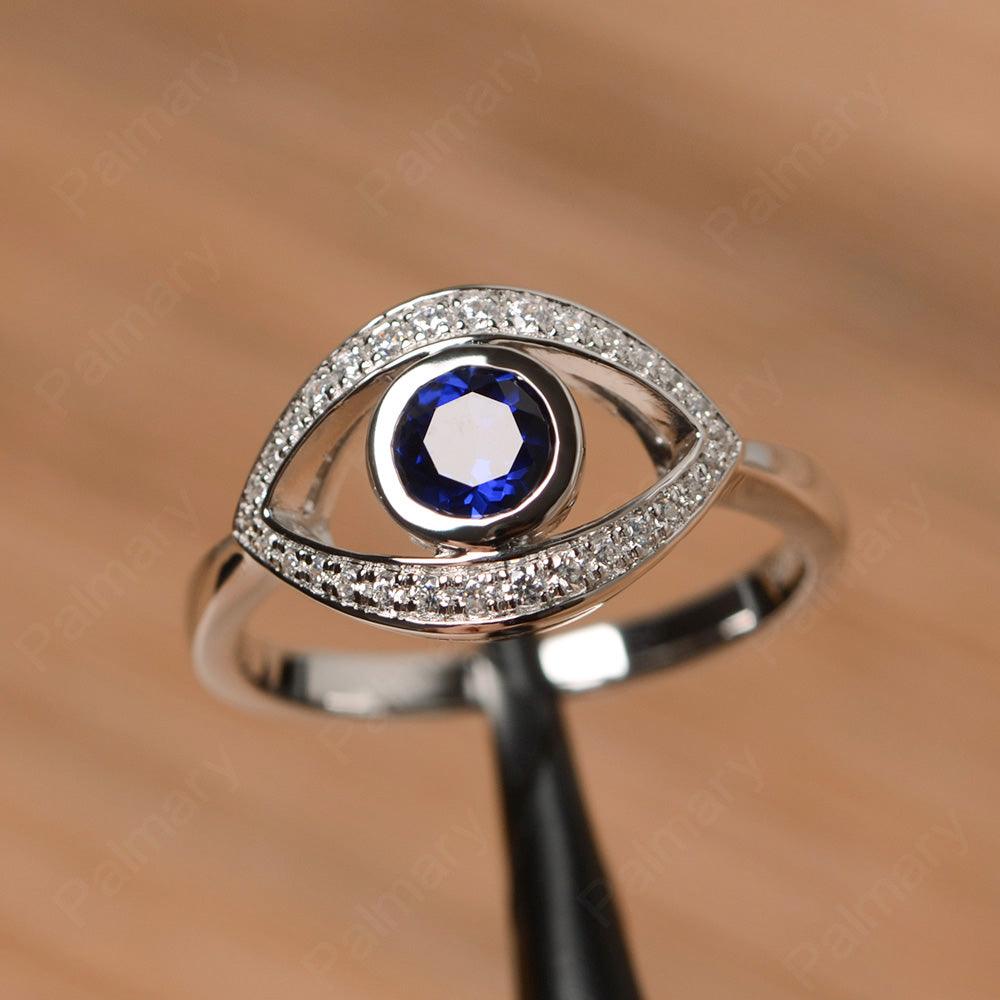 Eye Shaped Sapphire Bezel Rings - Palmary