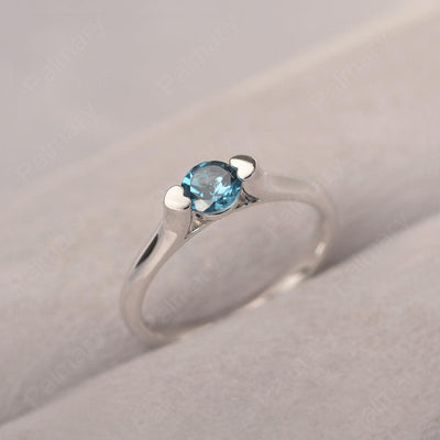Cute London Blue Topaz Solitaire Ring - Palmary