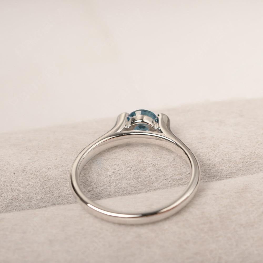 Cute London Blue Topaz Solitaire Ring - Palmary