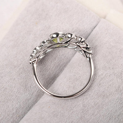 Bezel Setting Multi Stone Peridot Mothers Ring - Palmary