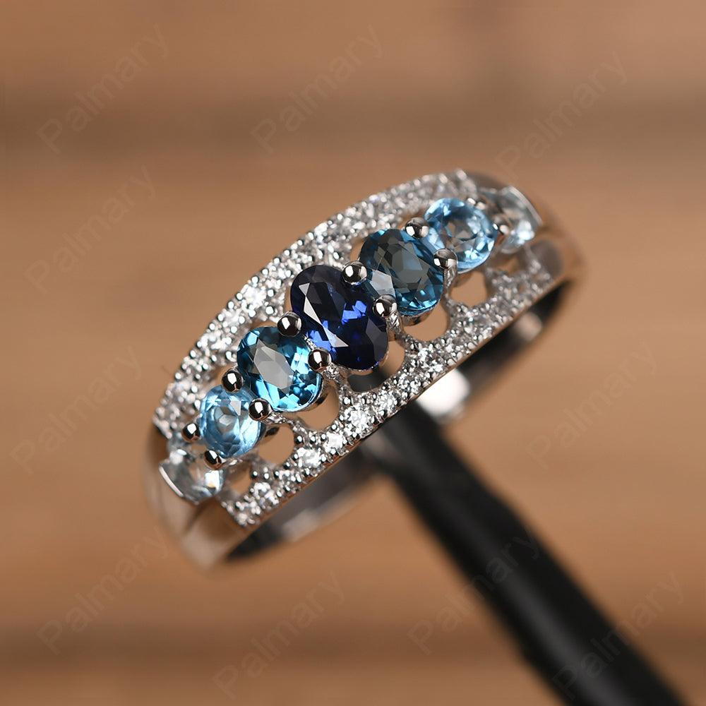 Wide Cluster Sapphire and Blue Topaz and Aquamarine Ring - Palmary