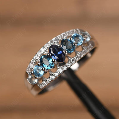 Wide Cluster Sapphire and Blue Topaz and Aquamarine Ring - Palmary