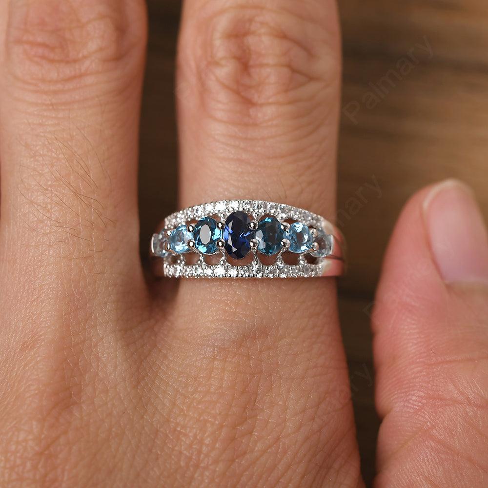 Wide Cluster Sapphire and Blue Topaz and Aquamarine Ring - Palmary