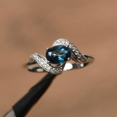 Oval London Blue Topaz Promise Rings - Palmary