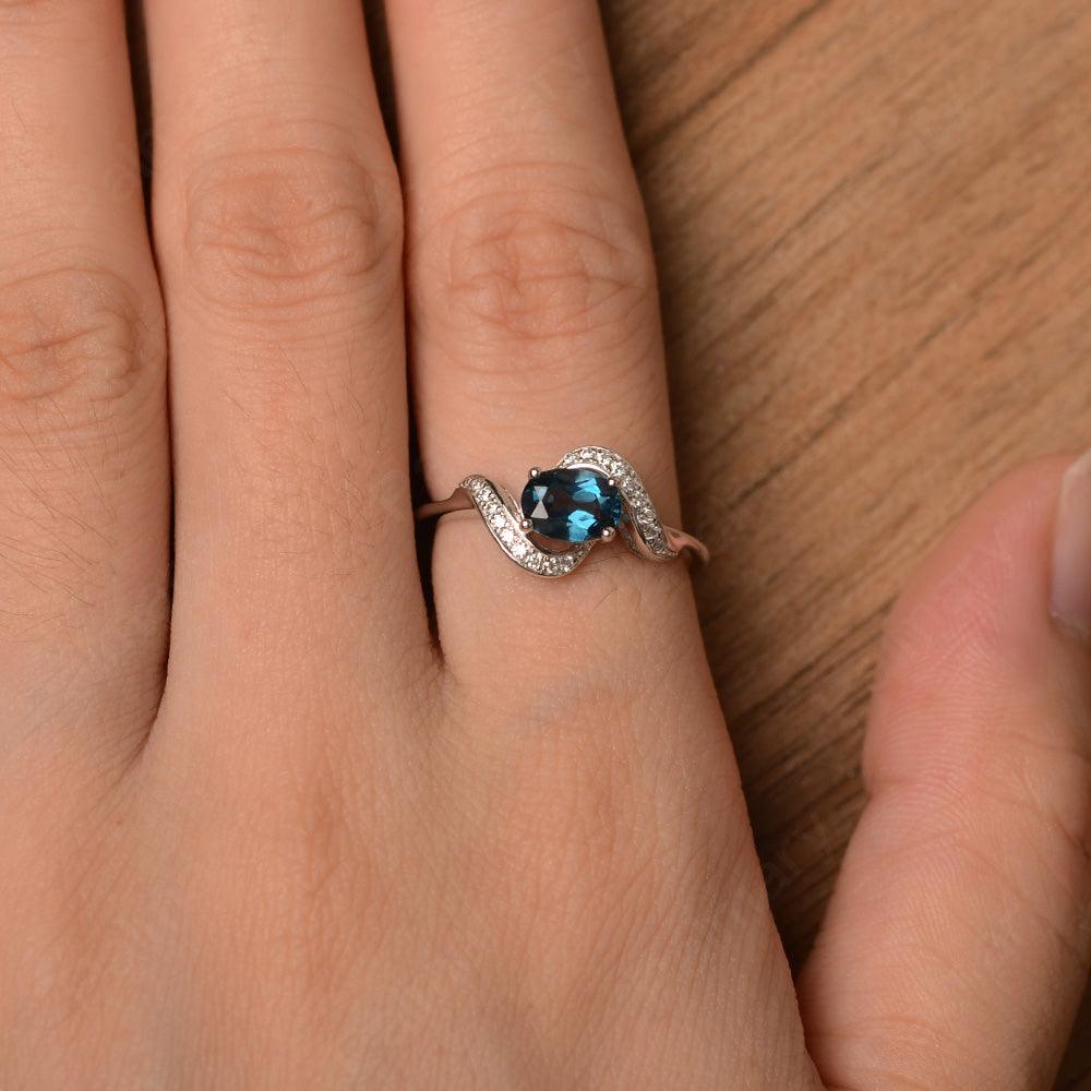 Oval London Blue Topaz Promise Rings - Palmary