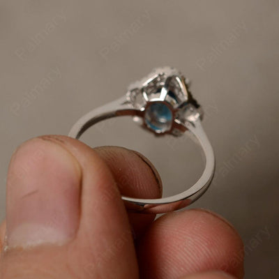 Oval Cut London Blue Topaz Flower Ring - Palmary